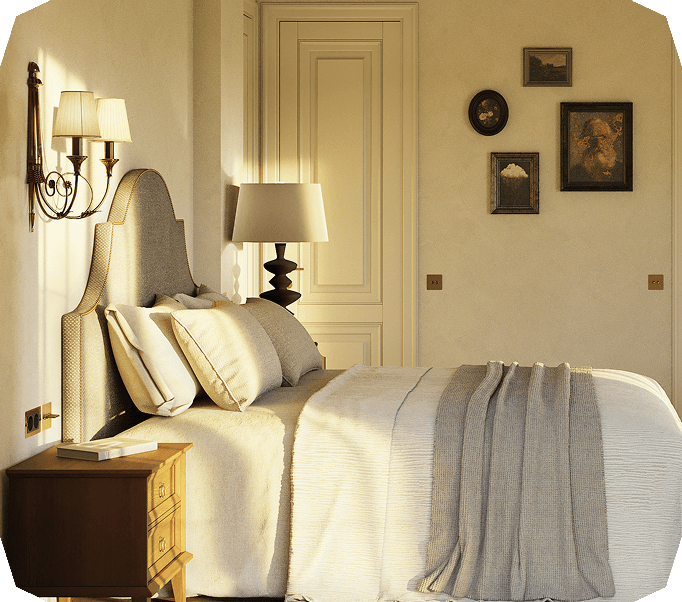 Bedroom with upholstered headboard and wall lamps